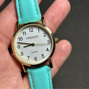Embassy Ladies Quartz Watch Gold Tone White Dial Teal Band Working GEM9116